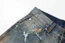 Ancellm Distressed Rust-Stained Jeans — Vintage Wash
