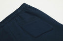 Pantalones de chándal de pernera ancha azul marino de Broken Planet