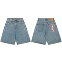 Corteiz Baggy Denim Shorts — Mid Wash in Blue, front view