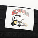 Jeans Evisu con bolsillo de camuflaje