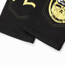 Vaqueros Evisu con calavera Daruma