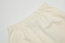 Fear of God Essentials Sweatshorts — Cream & Black