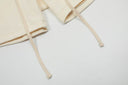 Fear of God Essentials Sweatshorts — Cream & Black