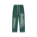 Pantalones de chándal "Wings" de Lost Intricacy - Rojo y verde