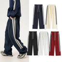 Camo stripe wide-leg track pants in Burgundy, Black, Grey and Olive