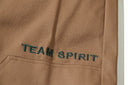 Vaqueros de carpintero con el logotipo "Team Spirit" — Negro y Marrón