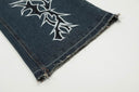 Jeans con parche desgastado "W" de Revenge