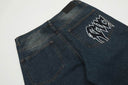 Jeans con parche desgastado "W" de Revenge