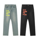 Revenge thorn embroidered jeans in dark wash denim, back view