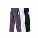FILA Nylon Track Pants — Purple, White & Black